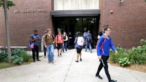 Photo of students exiting the McAllister Hall Building