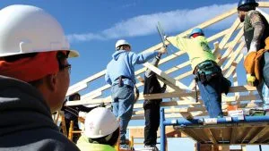 Photo of students constructing a building for the Building Trades program