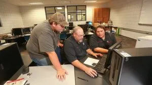 Photo of students working in a CAD lab