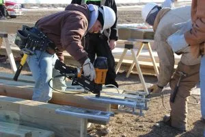 Picture of Building Trades students working on house