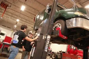 Picture of Diesel students working on Semi Truck